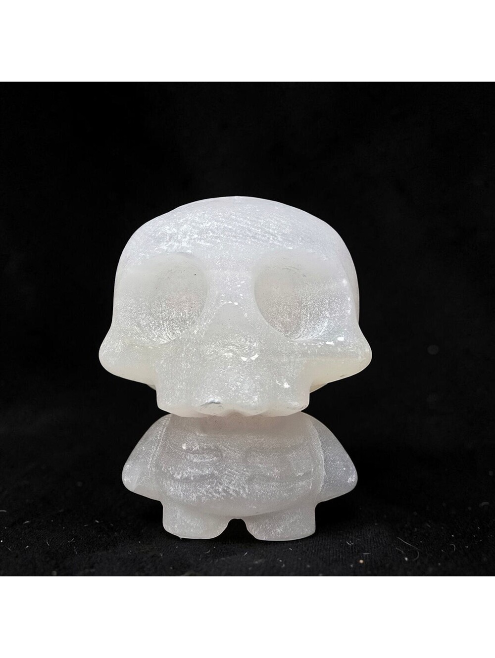 A153.  Pink Calcite Big Head Skeleton Guy Natural Crystal Carving - UV Reactive